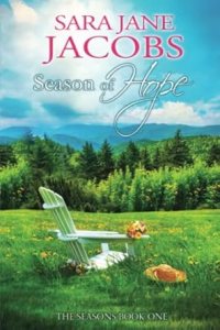 Cover of "Season of Hope" by Sara Jane Jacobs. It shows a serene landscape with a white chair, green field, flowers, and distant mountains under a blue sky.