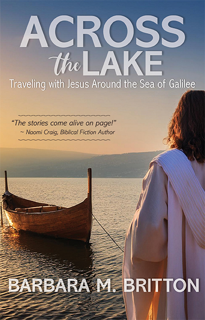 Cover of "Across the Lake" by Barbara M. Britton. A person in biblical attire gazes at a wooden boat on the Sea of Galilee at sunset, evoking a peaceful, spiritual tone.